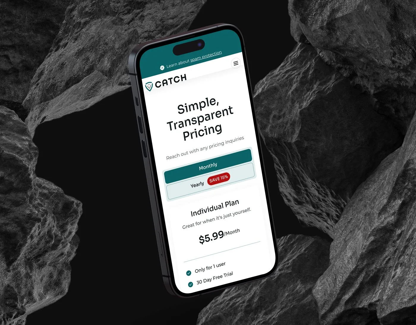 The Catch pricing page on an iPhone angled among dark volcanic rocks — the Simple, Transparent Pricing plans with their monthly and yearly toggle.