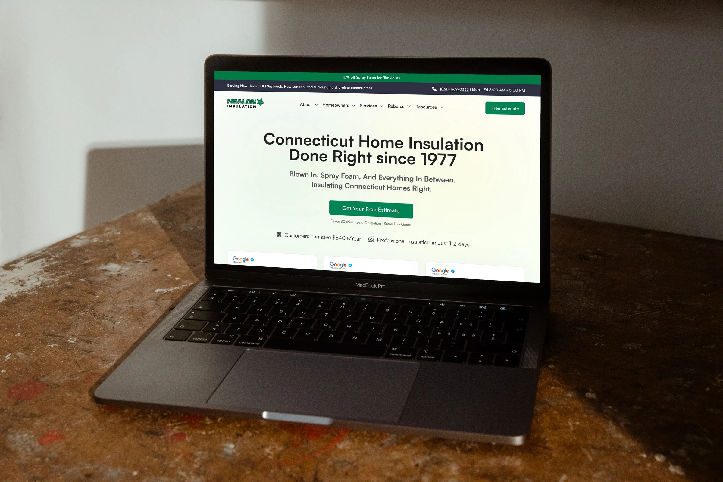Nealon Insulation website on a laptop