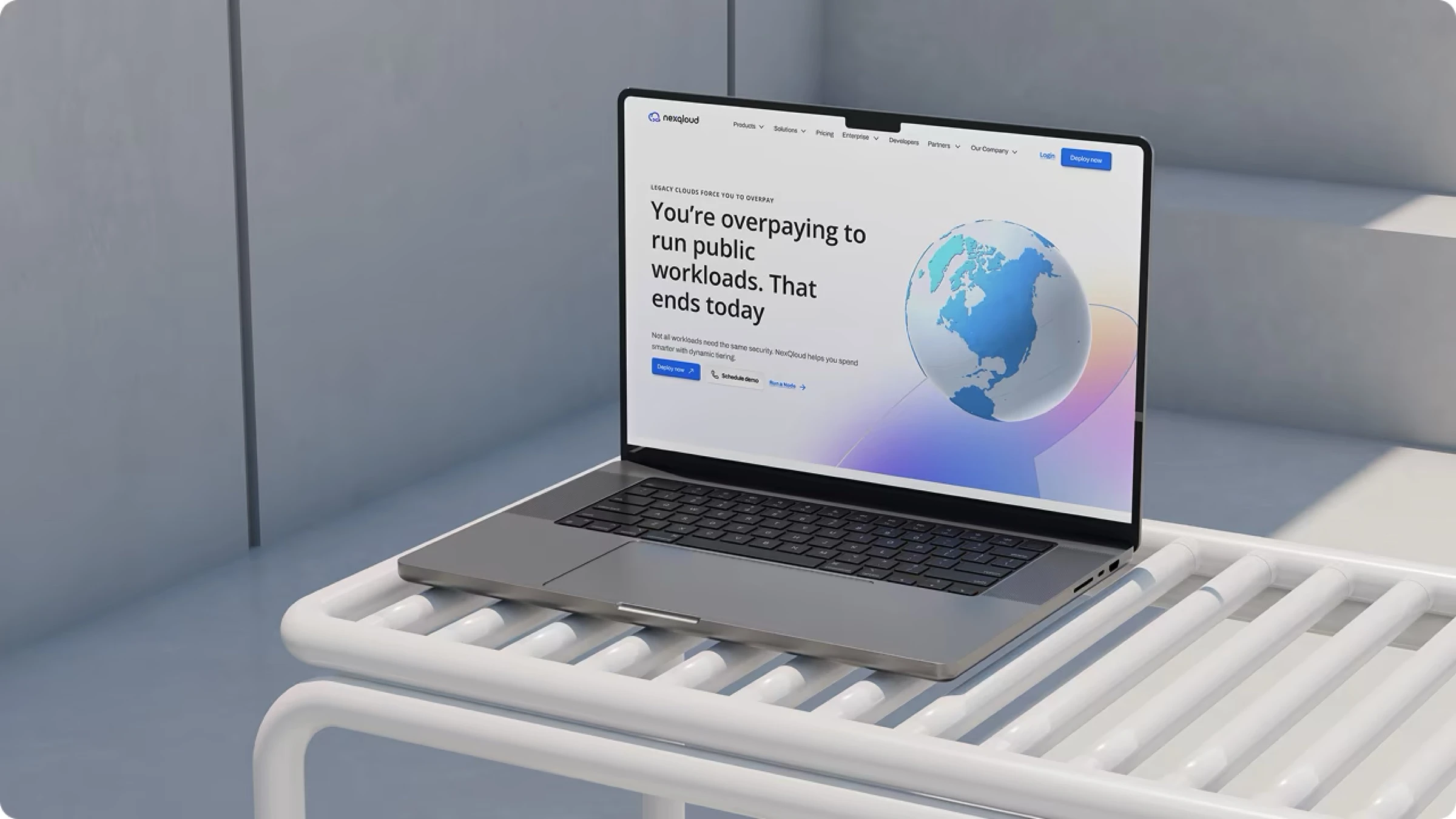 The NexQloud website on a laptop