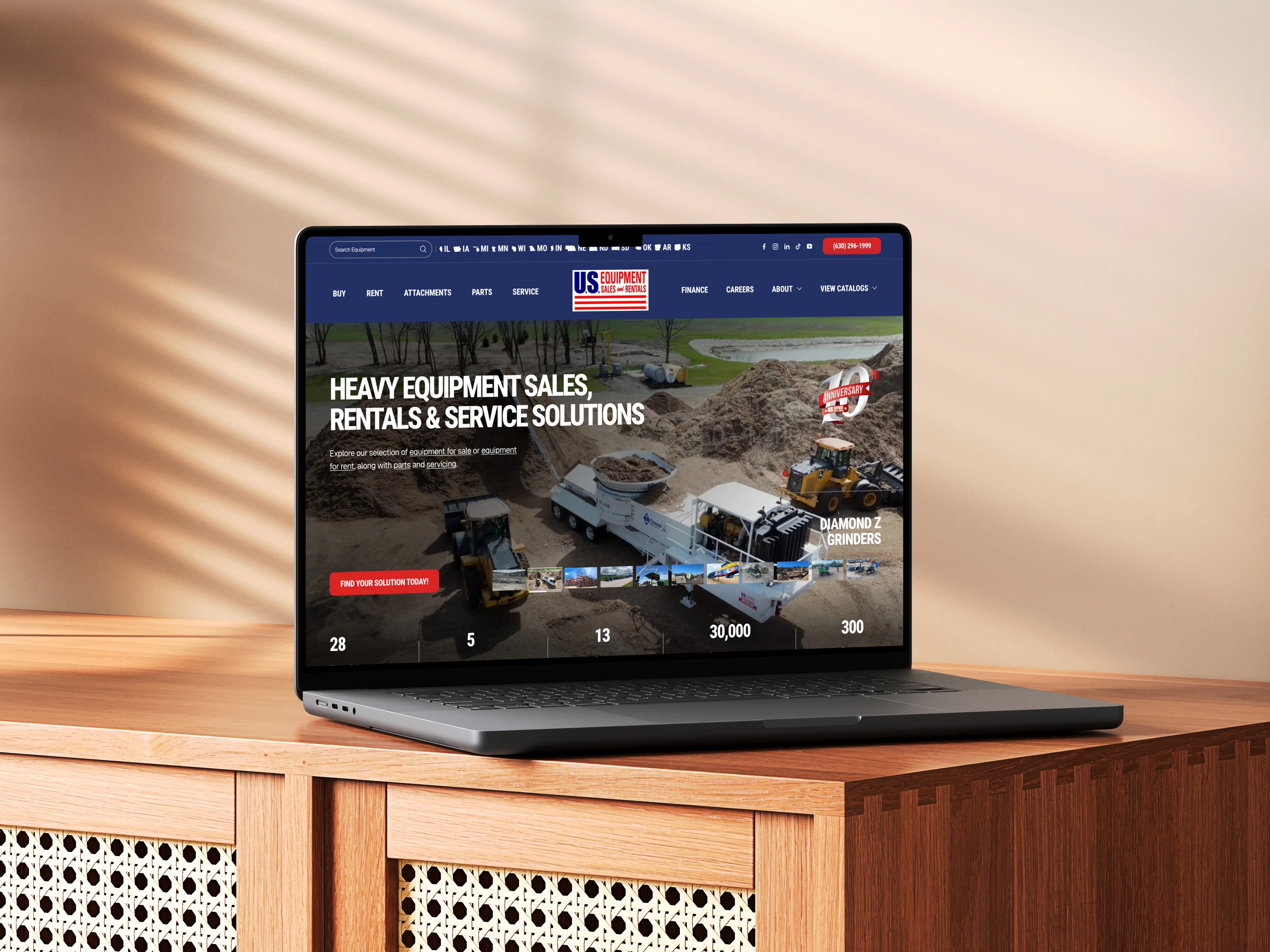 US Equipment Sales website on a laptop
