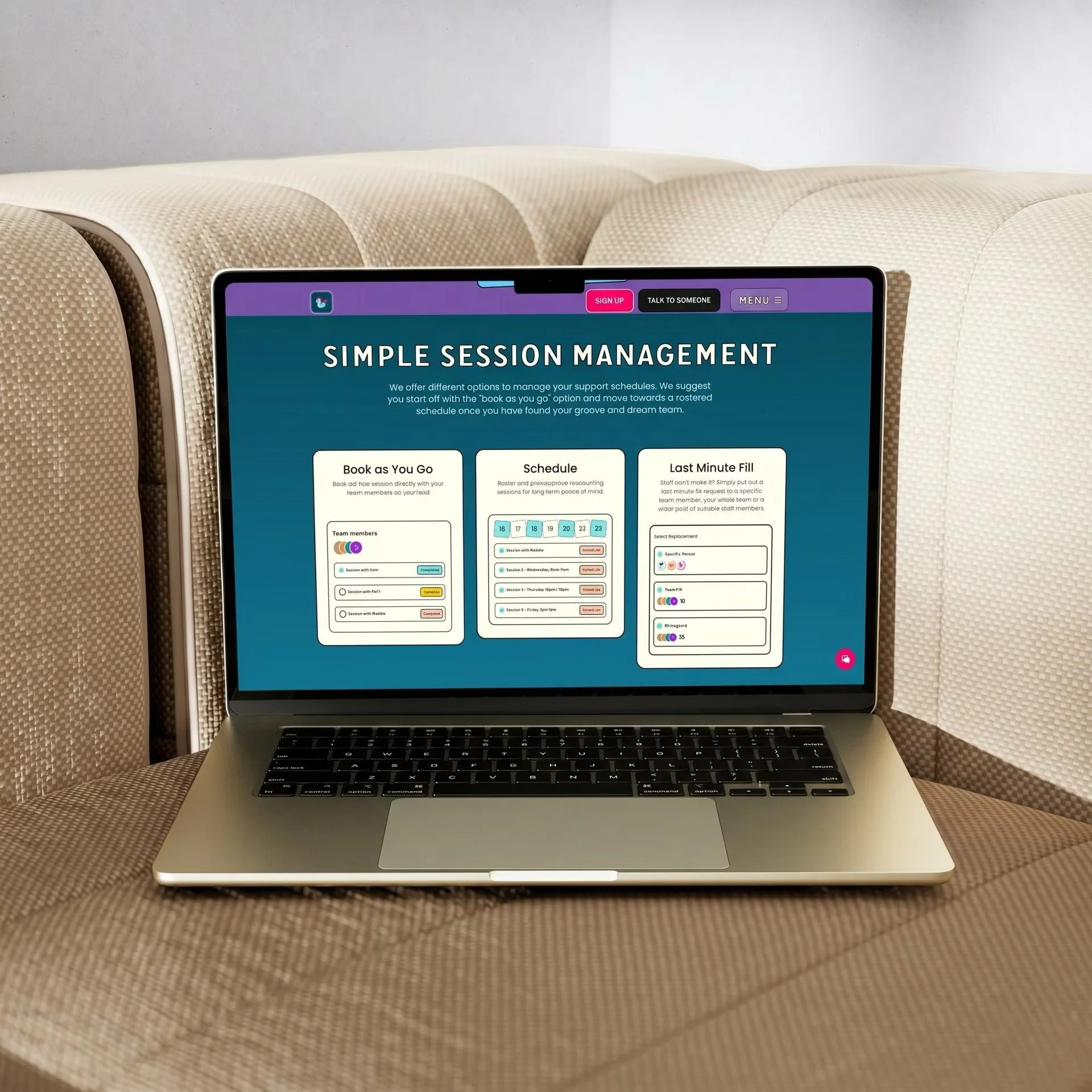 The Humdrum Simple Session Management section on a MacBook sitting on a beige woven sofa, showing the Book as You Go, Schedule and Last Minute Fill cards with their team-member, roster and replacement-picker panels.