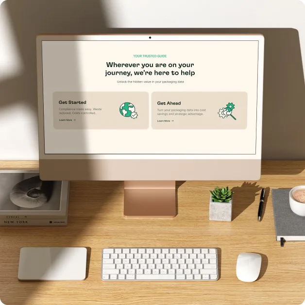The Phantm site on a desktop monitor on a desk, showing a guidance section headed “Wherever you are on your journey, we’re here to help”.