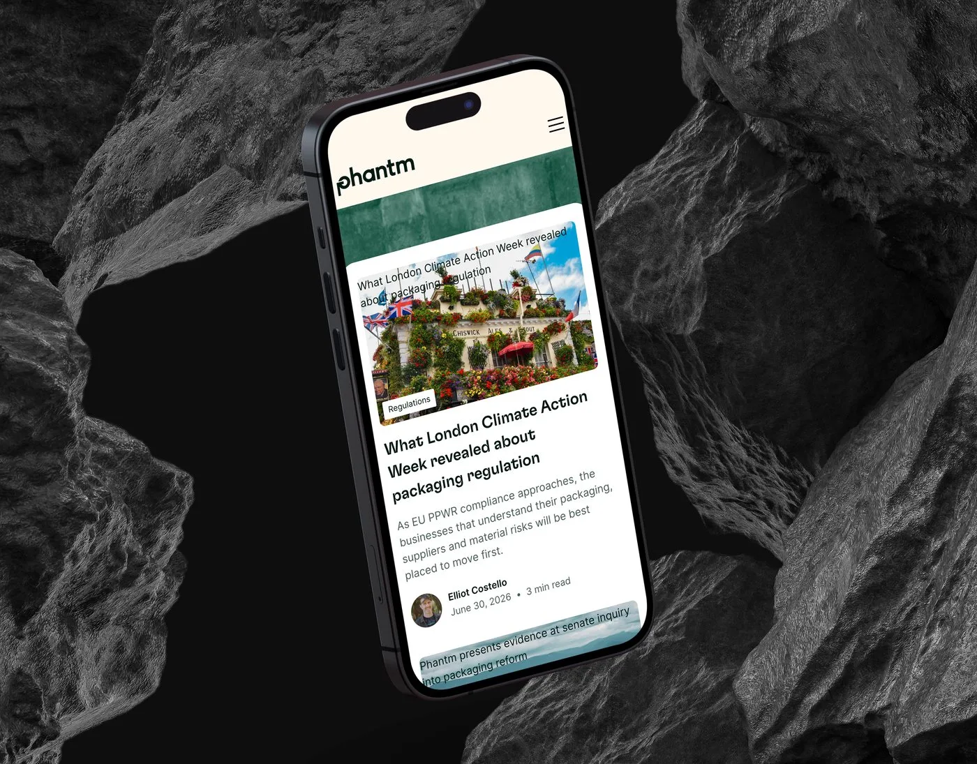 The Phantm blog on an iPhone angled among dark volcanic rocks — the What London Climate Action Week revealed about packaging regulation feature leading the insights feed.
